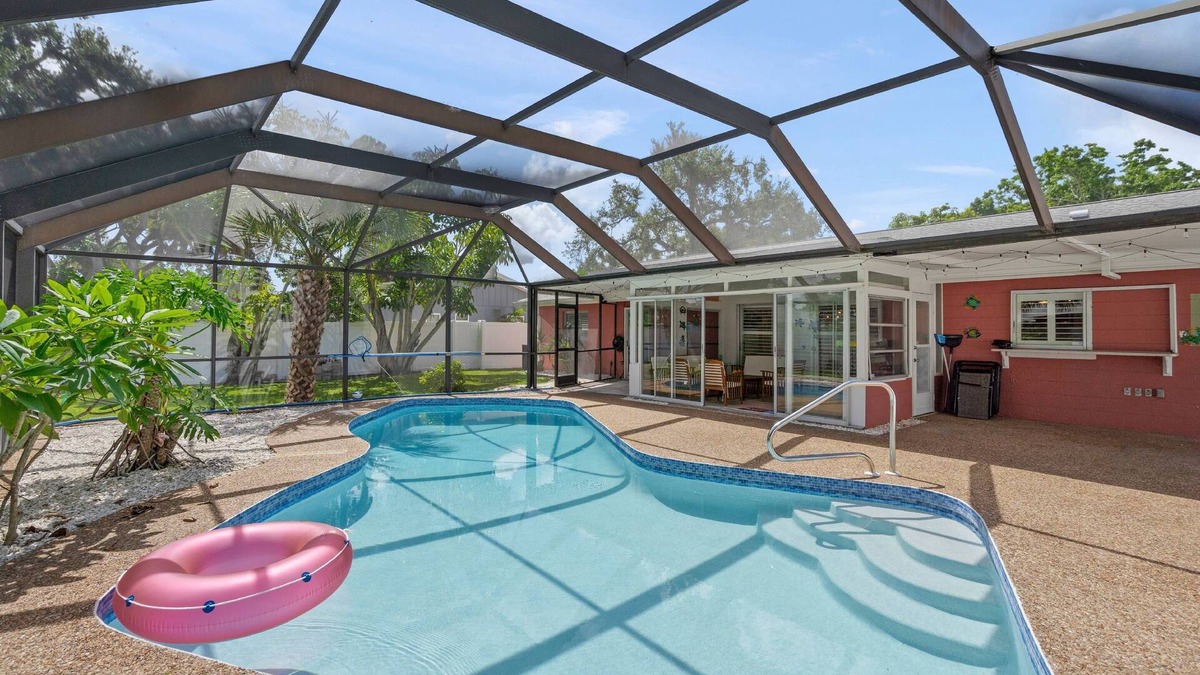 Gulf Gate Estates House | Relax in style at Coral Breeze! Your private Sarasota escape | Heated pool | Sunroom | Dog-friendly