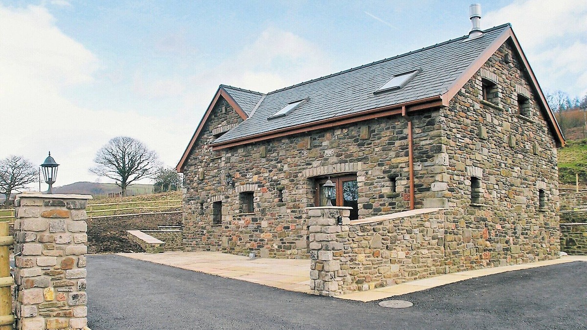 Neath Cottage | Relax in the shared indoor heated swimming pool, hot tub or sauna.