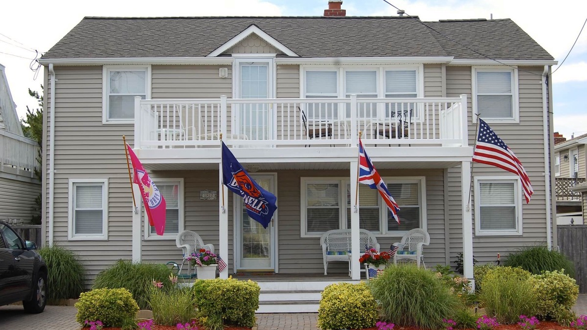 North Beach Haven House | Relax on the deck of this 2nd floor oceanside duplex just steps from the beach.