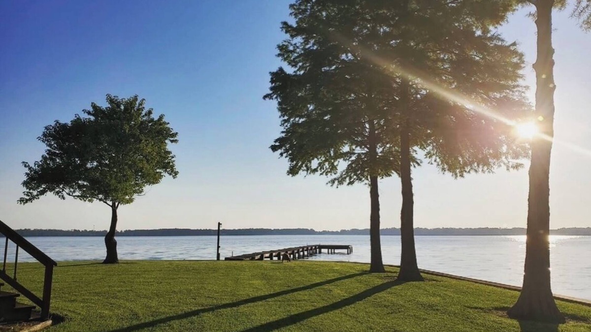 Durants Neck Cottage | Relax on the Little River with a pool, fishing, and river access.