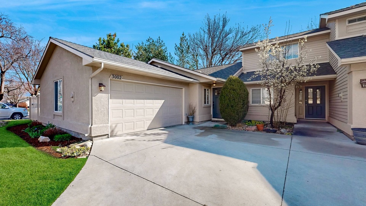 Southeast Boise House | Relaxing retreat with a gas fireplace, fenced yard, patio, & washer/dryer