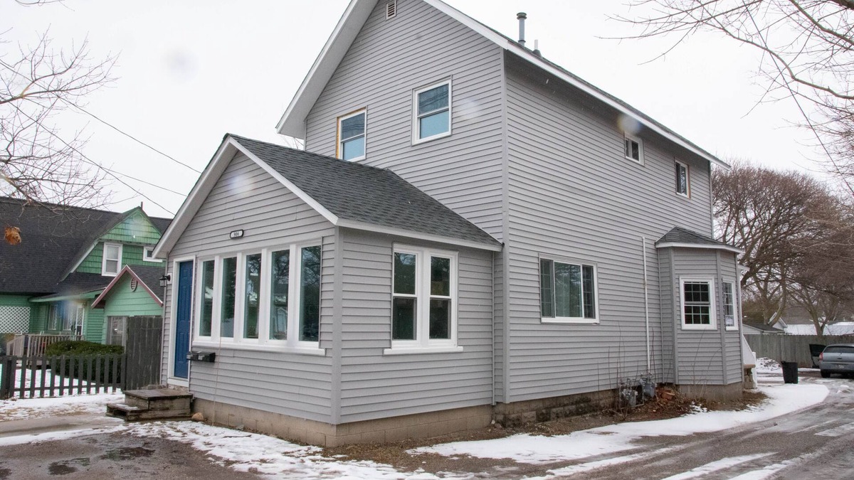 Charlevoix House | Remodeled 2-bedroom first floor unit in the heart of Downtown Charlevoix.