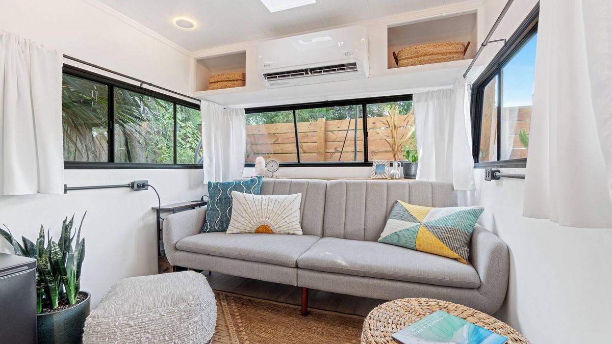 Navy Point House | Renovated 1970’s retro camper on Bayou Grande in Pensacola with walking trail.