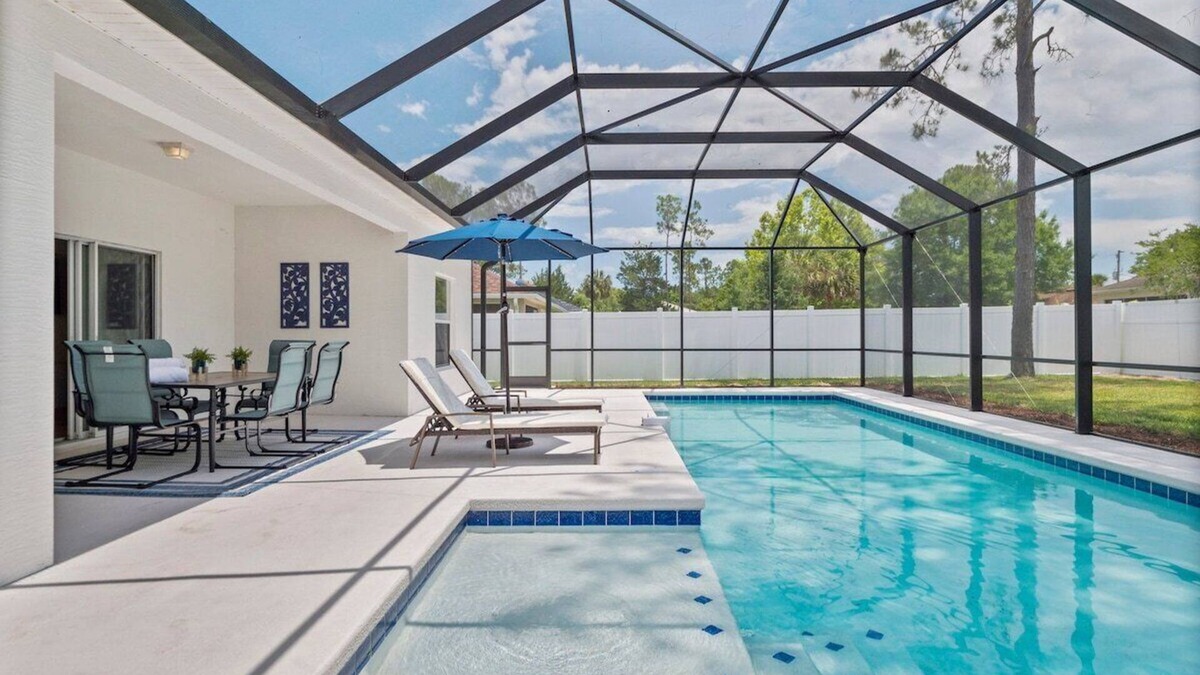 Palm Coast House | Renovated Heated Pool home with Game room and Bicycles