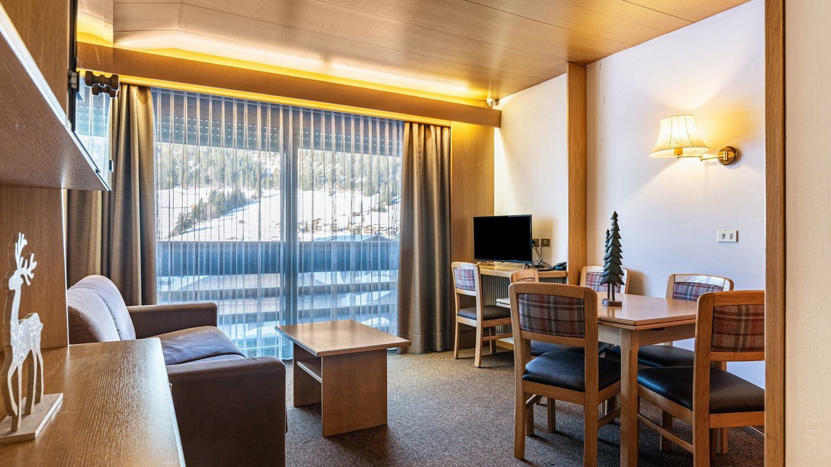 San Giovanni di Fassa Apartment | "Residence Anda Appartamento 42" with Views of the Dolomite Peaks, Shared Indoor Pool & Jacuzzi