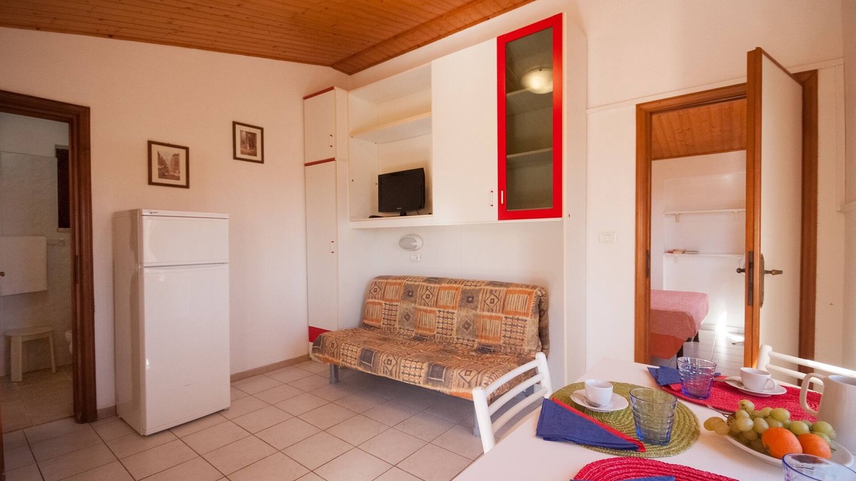 Capoliveri Resort | Residence La Valdana - 4 person apartment with swimming pool, tennis and parking 1km from the beach