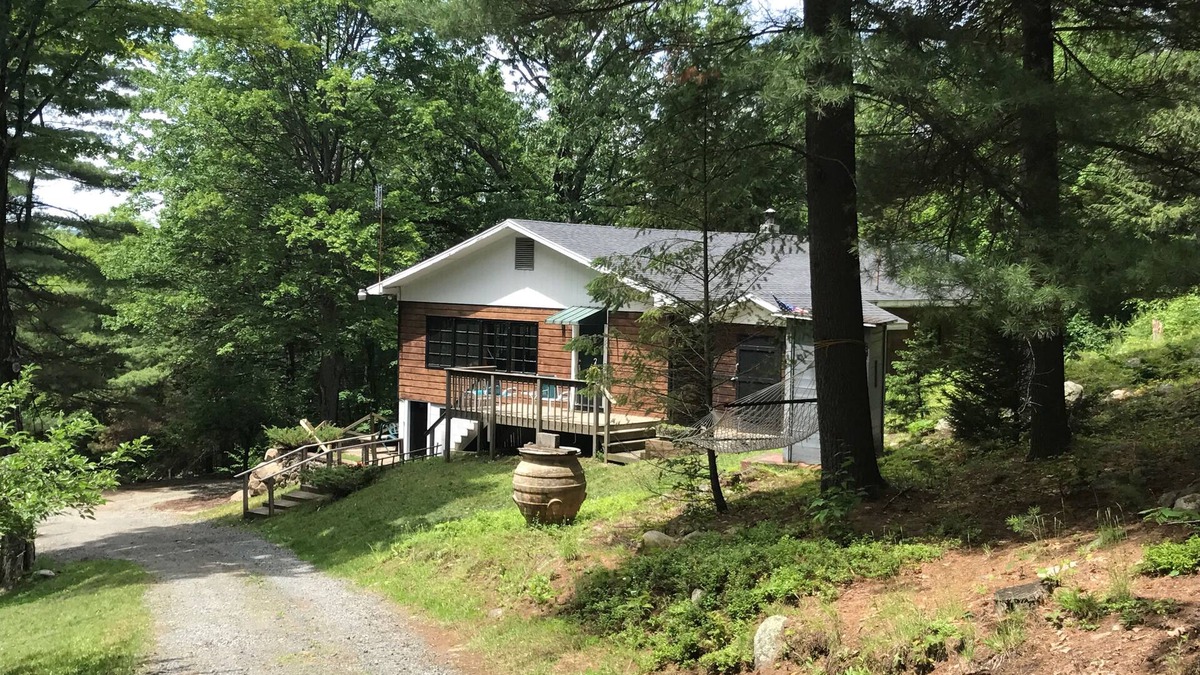 Northville House | Retreat into the woods and discover peace. And a hot tub with a view