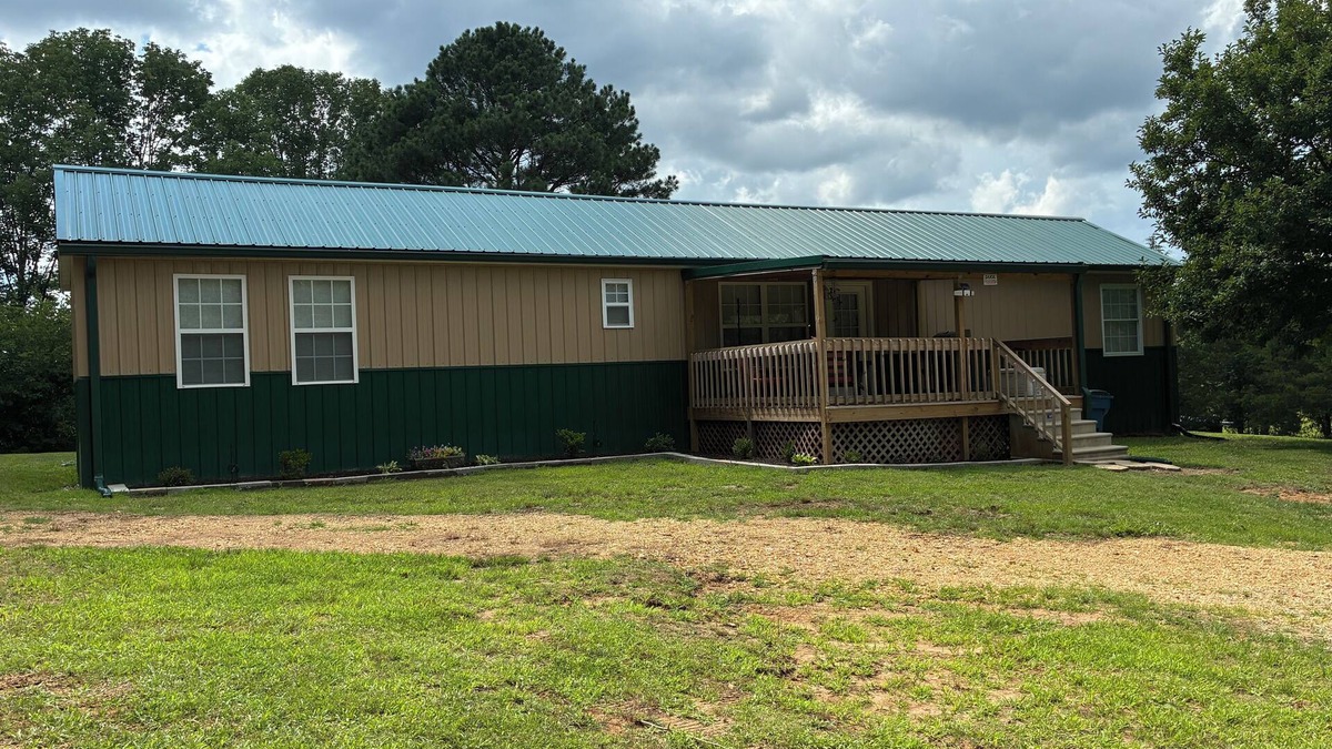 Milan House | Retreat to the peaceful Tennessee countryside. Pet-friendly.