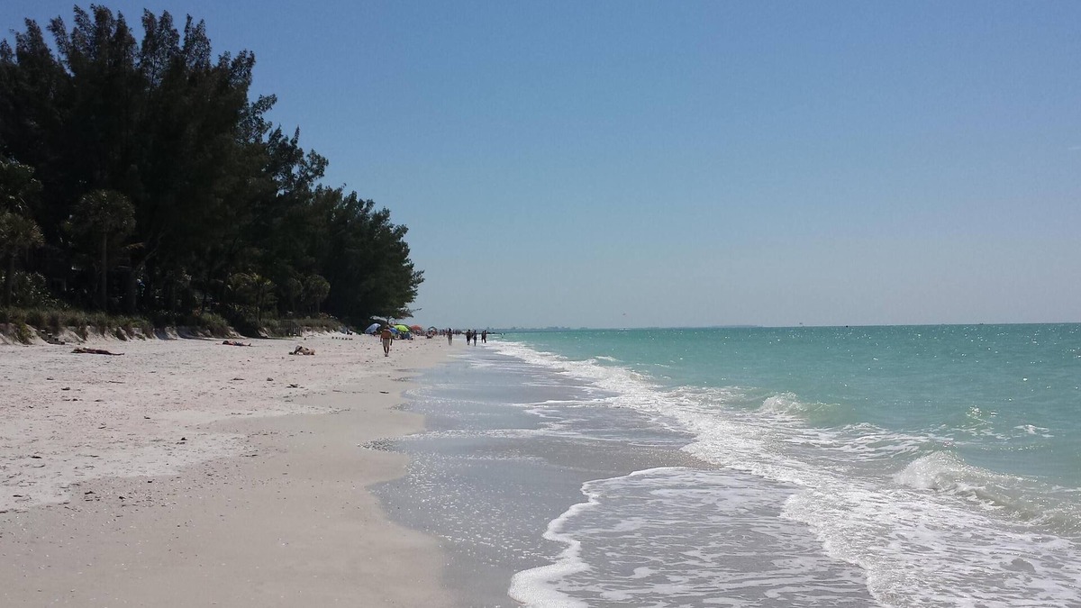 Sunset Beach Condo | Right on the Gulf! Beautiful white sandy beachfront! Safe, quiet, and friendly!