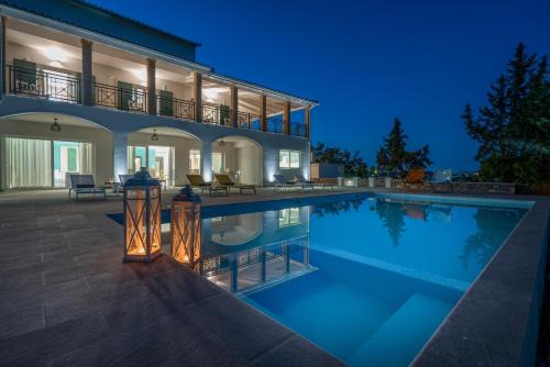 Porto Koukla Villa | Rivazzurra Beachfront Luxury Villa