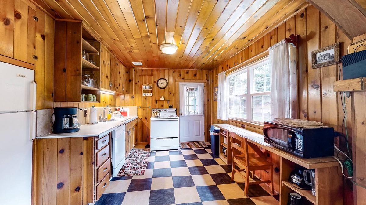 Wallowa County House | Riverfront cabin with large yard, great deck, fireplace, washer/dryer, & WiFi
