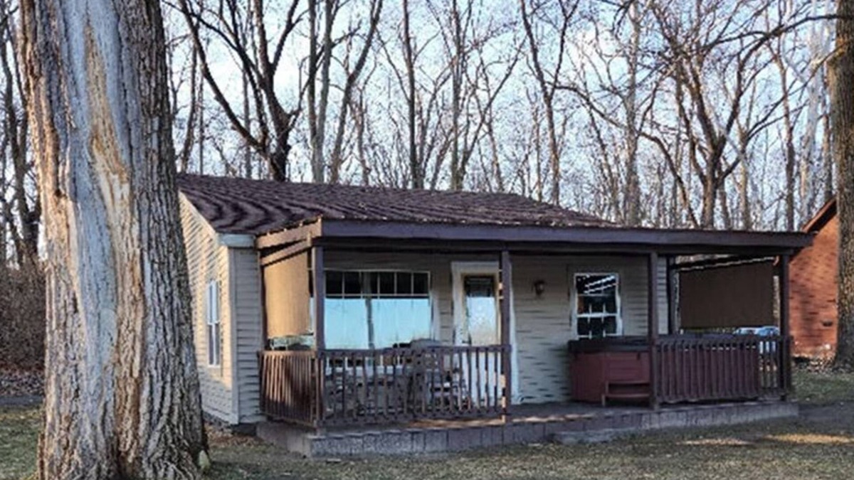 Colton Cottage | Riverfront Cottage with Hot Tub, Kayaks, Canoes, & Fishing Boats!