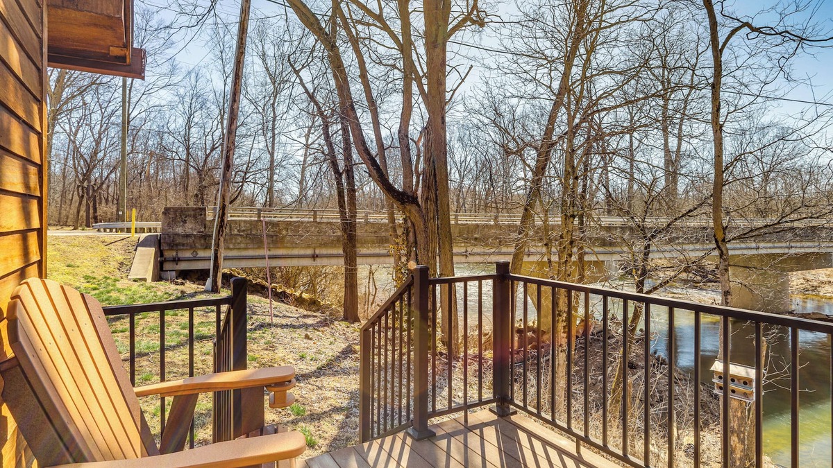 Covington Cottage | Riverfront Covington Cabin w/Deck & Fire Pit!