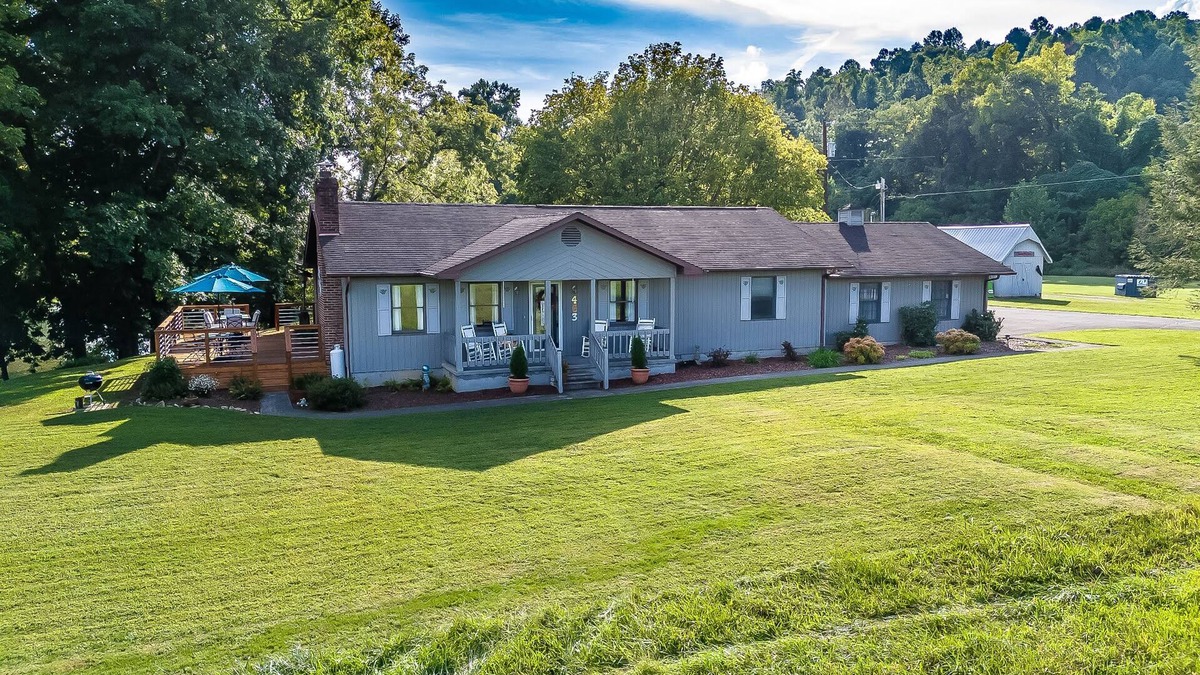 Elizabethton House | Riverfront home with dock, mountain view, grill, firepit, smart TVs