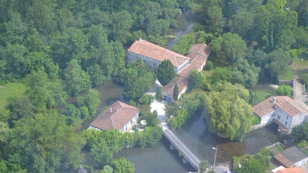 Pons Cottage | Riverside cottages & watermill in Pons with heated swim spa/pool.