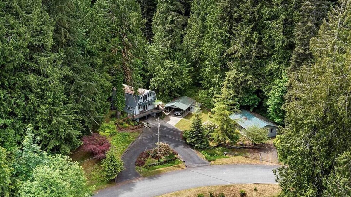 Brinnon House | Riverside luxury, with a hot tub, in the woods.