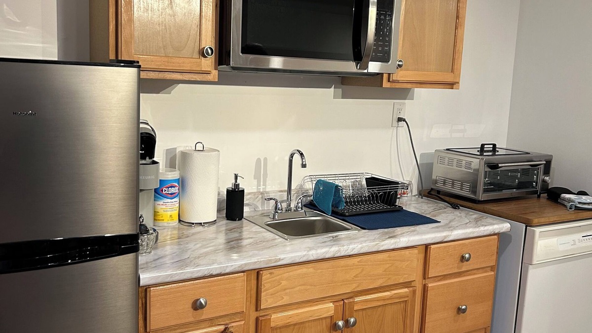 Bairdford Apartment | Riverside Retreat, a charming studio near Oakmont and Pittsburgh with WiFi, AC