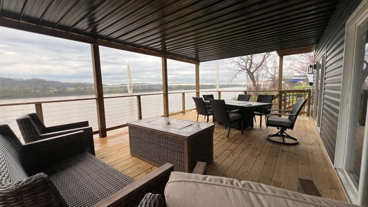Russell Condo | RiverSuite1 - A mesmerizing river & bridge view.