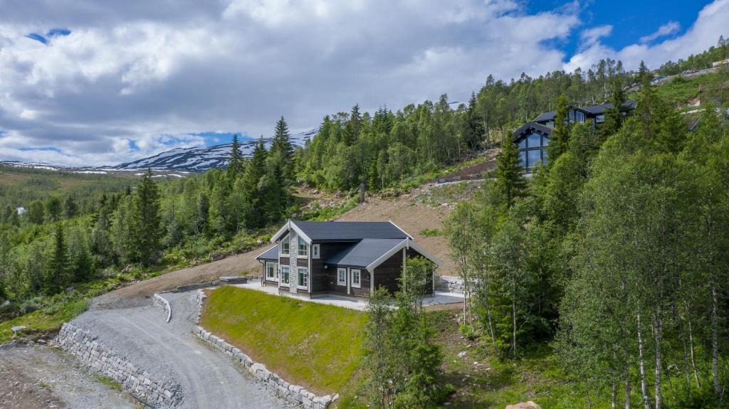 Sogndal House | Rolfhytta - Fosskamben 19