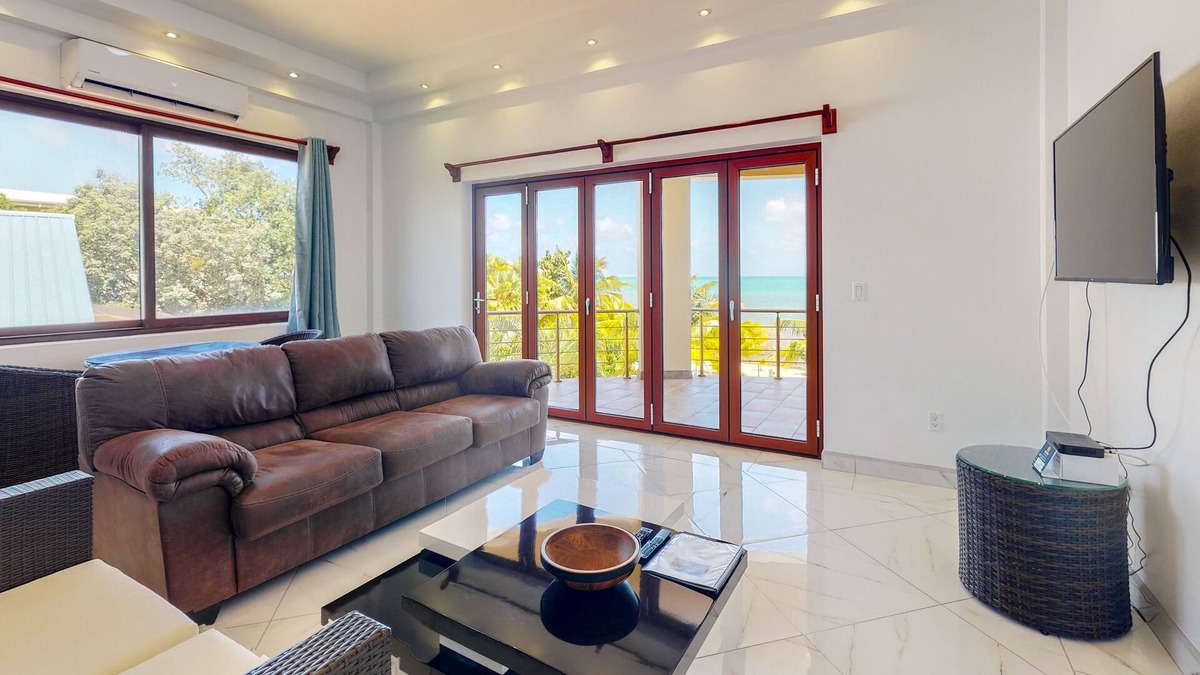 Surfside Condo | Romantic beachfront apartment w/ ocean views, shared pool, partial AC & WiFi!