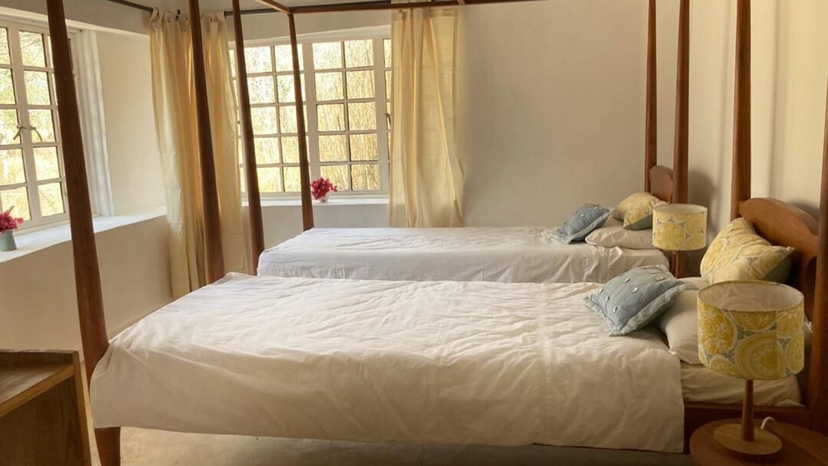 Arusha House | Romantic eco cottage within the Arusha Giraffe Centre re-wilded farm.