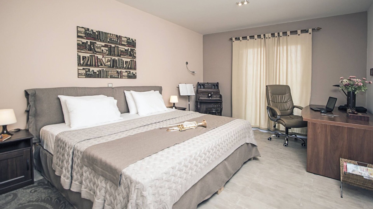 Gouvia Villa | Roof Garden Villa is located on the hill top near Gouvia with beautiful views.
