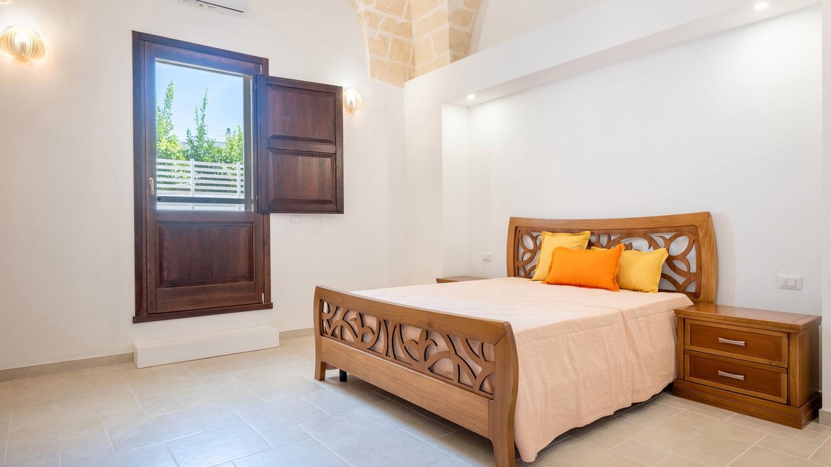 Pulsano Apartment | Room 'Piano Terra' with Private Garden, Wi-Fi and Air Conditioning