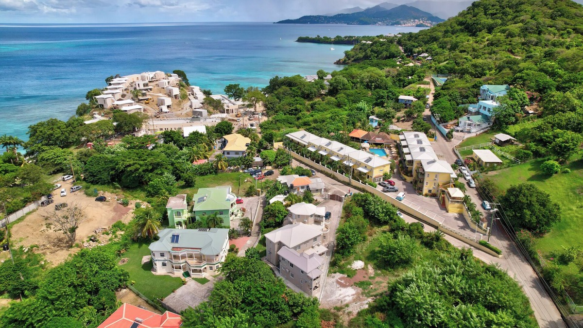 Morne Rouge Apartment | Roomy [1,001 sq ft] two bedroom Unit, steps away from white sand beach.