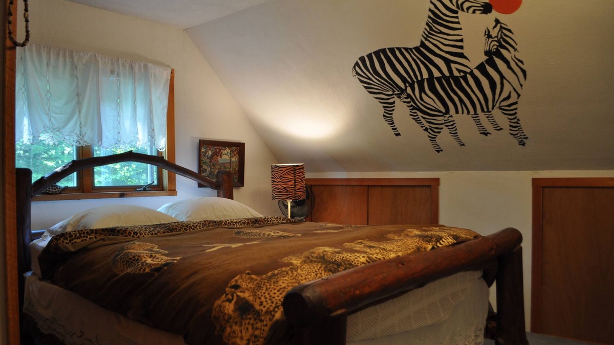 Spencer Bed & Breakfast | Russian and South African room in cabin surrounded by state forest