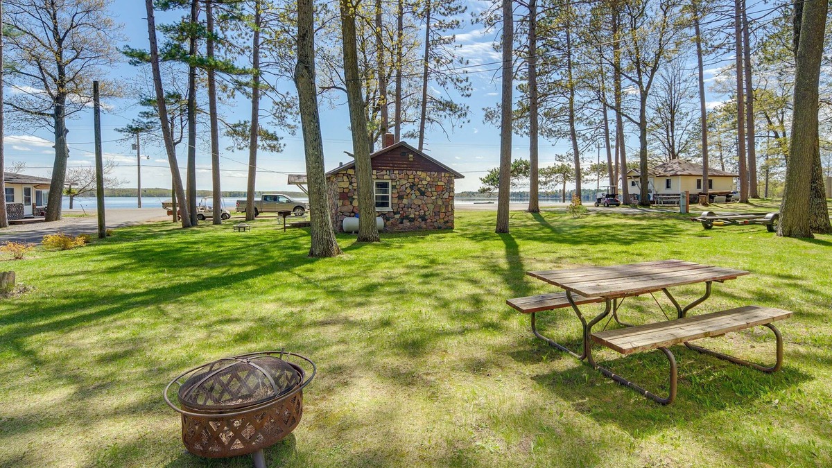 Stone Lake Cabin | Rustic Cabin w/Fire Pit, Steps to Sand Lake!
