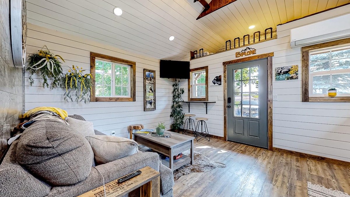 Evergreen House | Rustic getaway with fireplace, patio area, board games, full kitchen, & TV