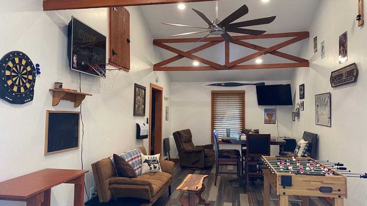 Prudenville House | Rustic home on wooded lot, very private. Lake and dock access. Close to trails.