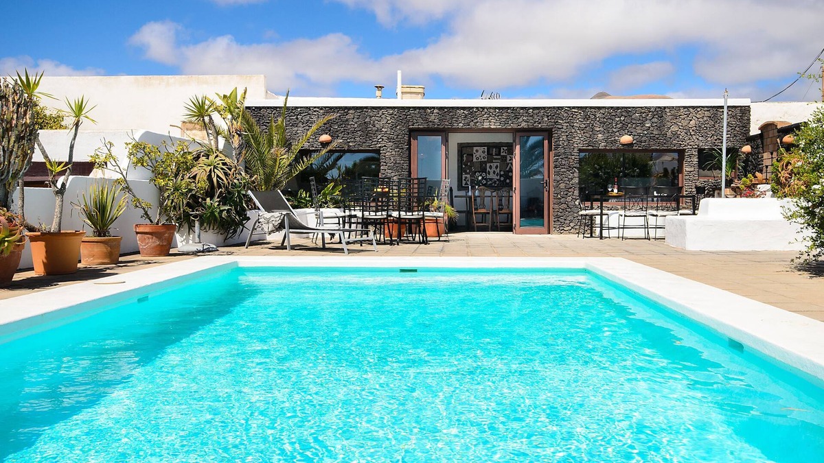 Guime House | Rustic Home Short Drive from Beach with Pool, Terraces & Garden