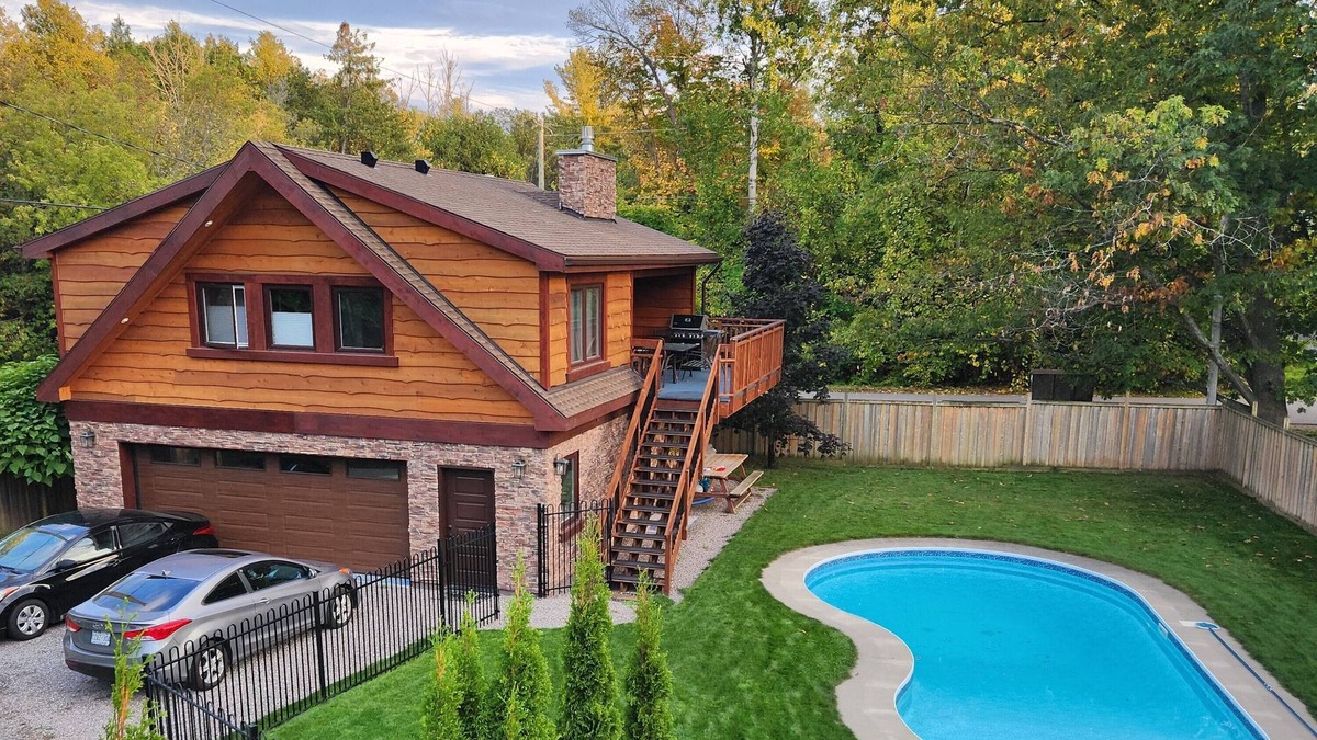 Barrie Ski Chalet | Rustic luxury chalet with pool, a two-minute walk to beach, park and playground!