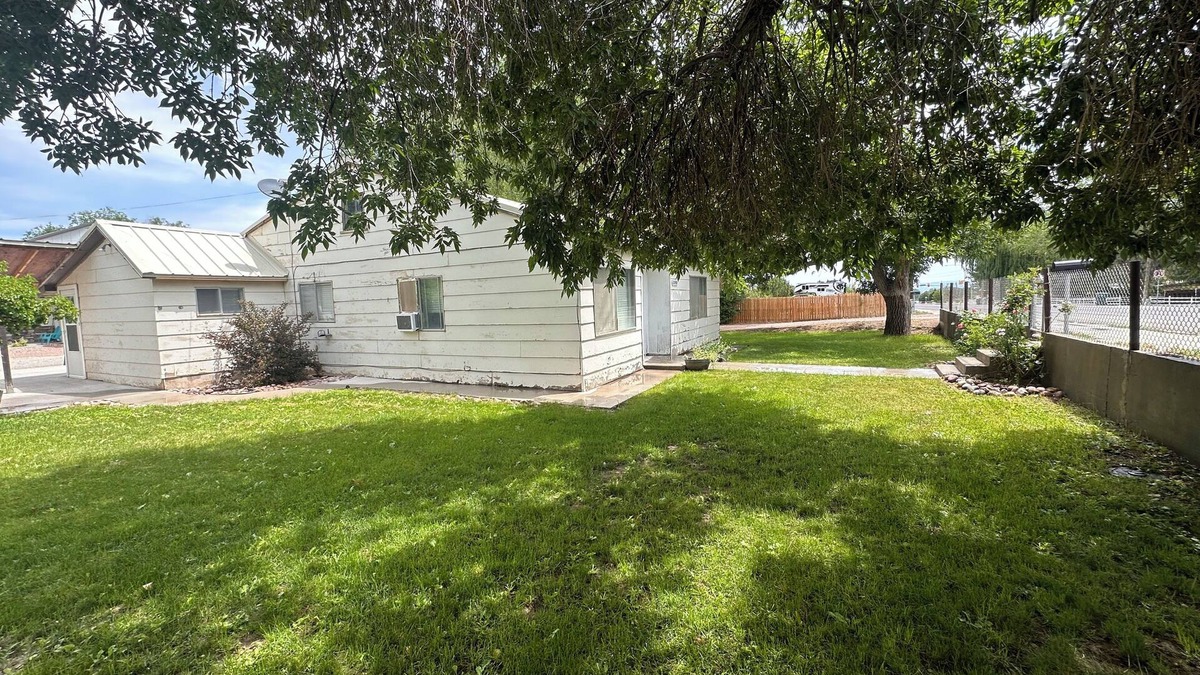 Maeser House | Rustic nice home in Vernal UT 2 bedrooms with queen beds 1 full bathroom.