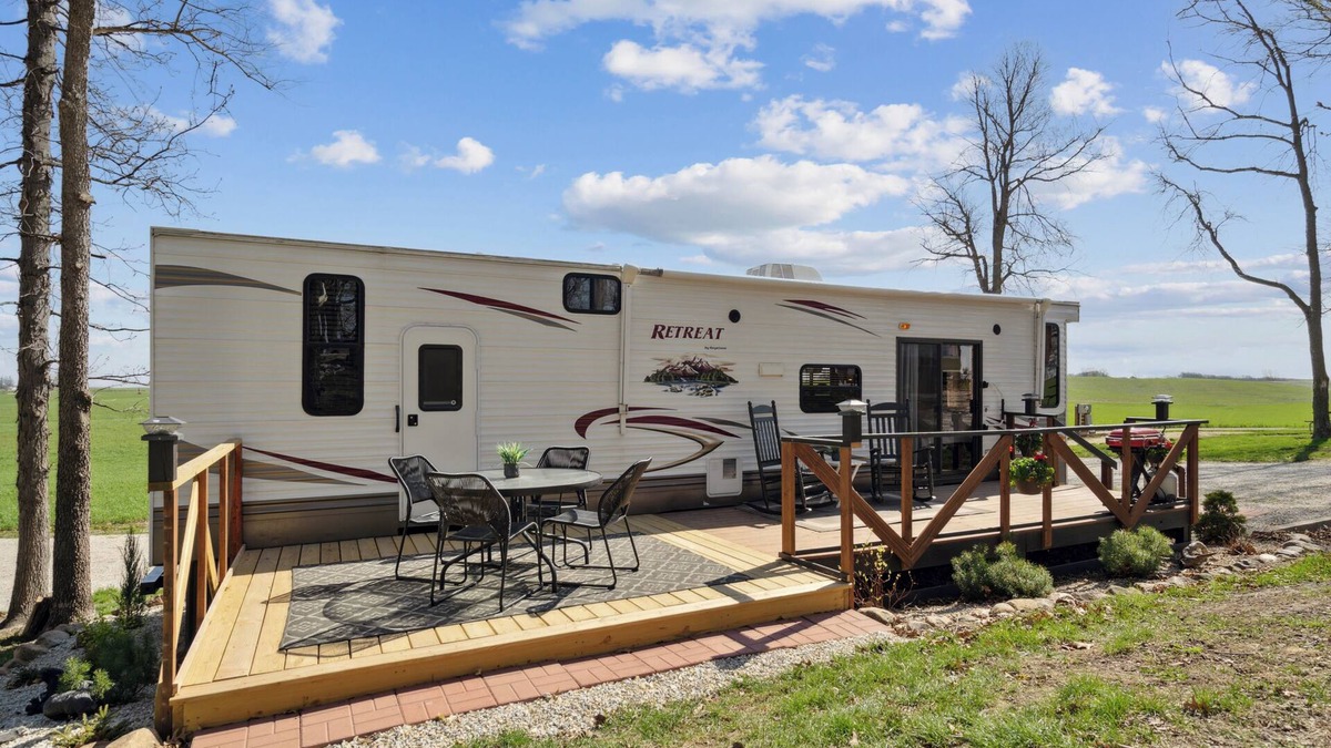 Langworthy RV Rental | Rustic Retreat Camper - on Silver Lake in Delhi. Pet Friendly!
