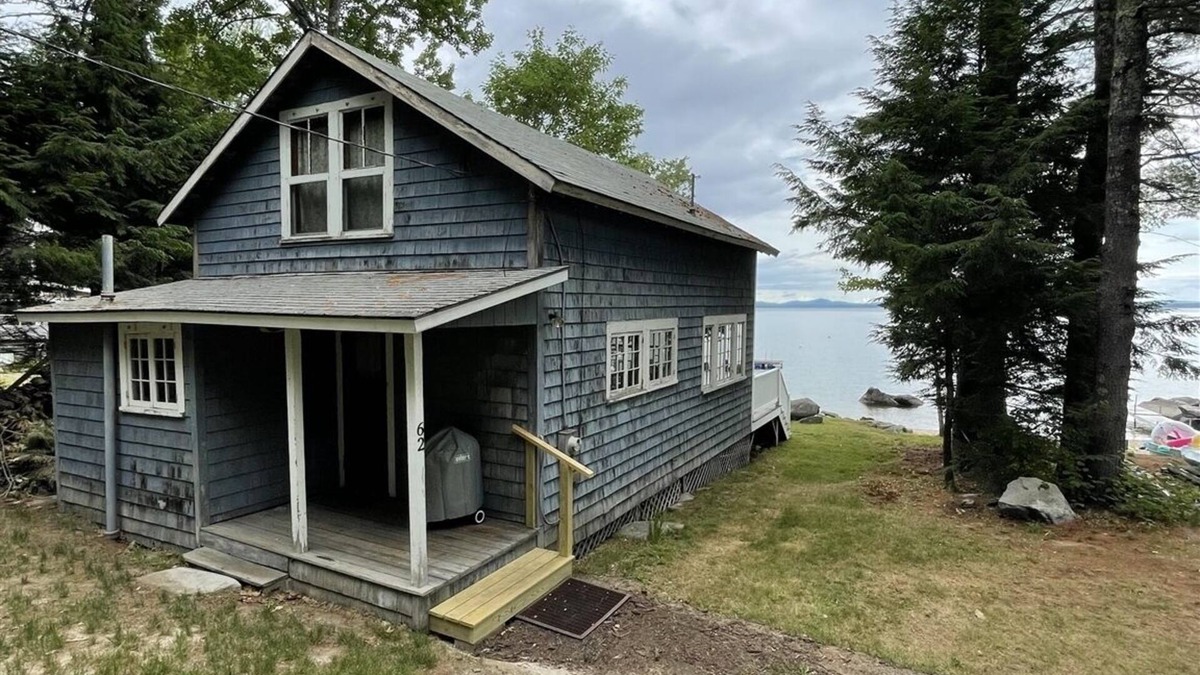 Standish Cottage | Rustic shorefront cottage with a small sandy beach