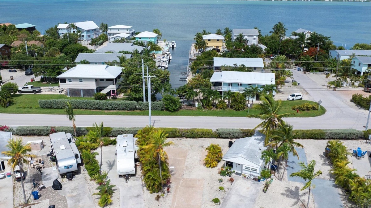 Cudjoe Key RV Rental | RV Lot in Oceanfront Community | Concrete Pad, Lush Landscaping, Walk to Pool & On Site Store