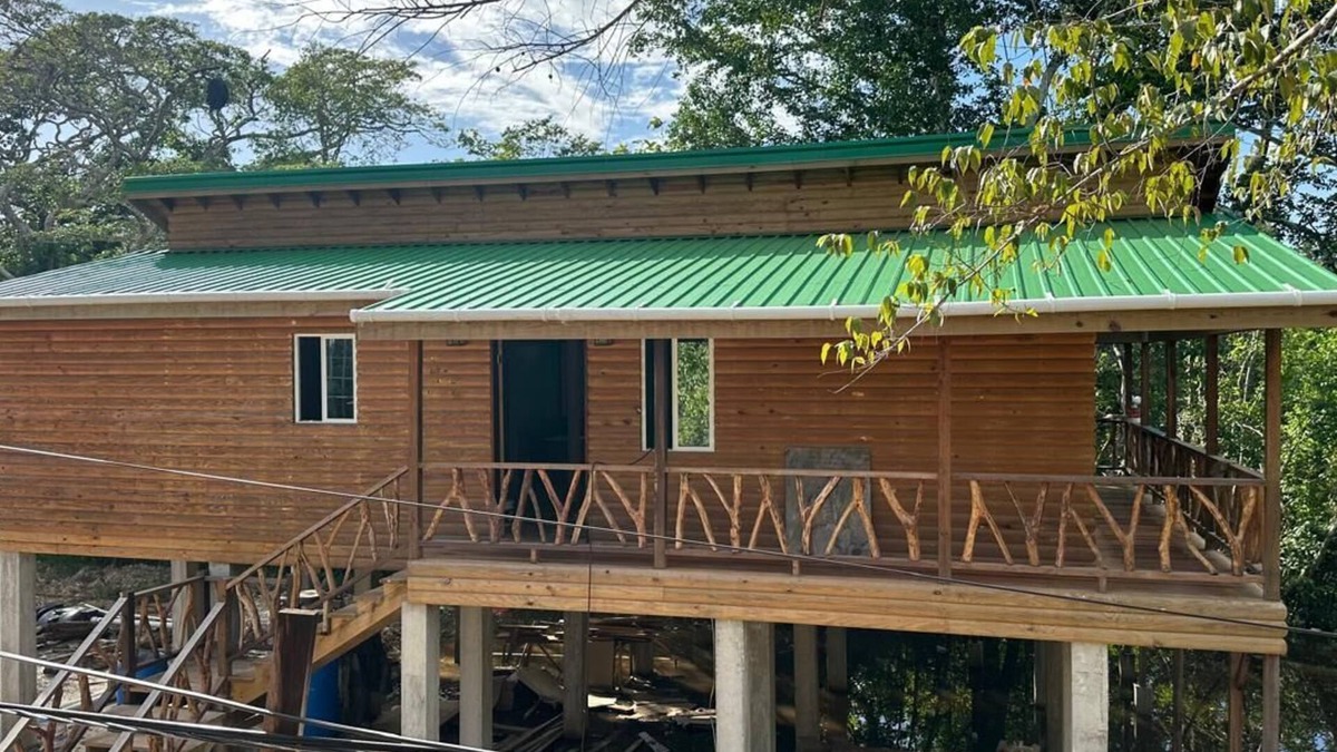 Burrell Boom House | Sade's Enchanted cabin Luxurious Jungle Cabin near the River with AC and WIFI
