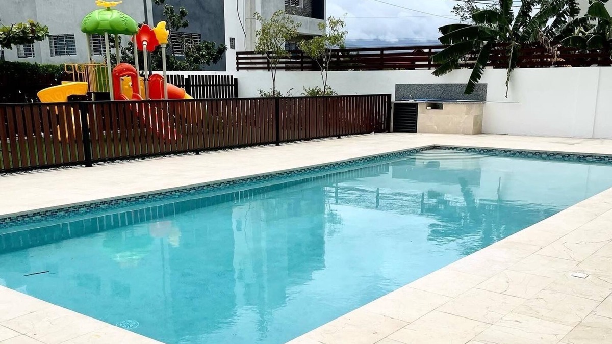 Gregorio Luperon Condo | Safe & Charming private 3-bedroom condo with pool, WiFi, fitness room