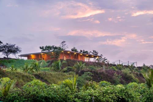 Igatpuri Villa | SaffronStays Zen, Igatpuri - lake-view villa with indoor and outdoor games