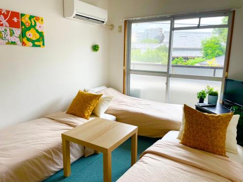 Toyonaka Apartment | Sakura202 伊丹空港アクセス抜群タイニールーム最大3名宿泊可能