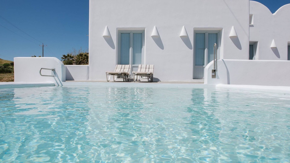 Karterados Villa | Sand Villa - sea front luxury villa by Monolithos beach.