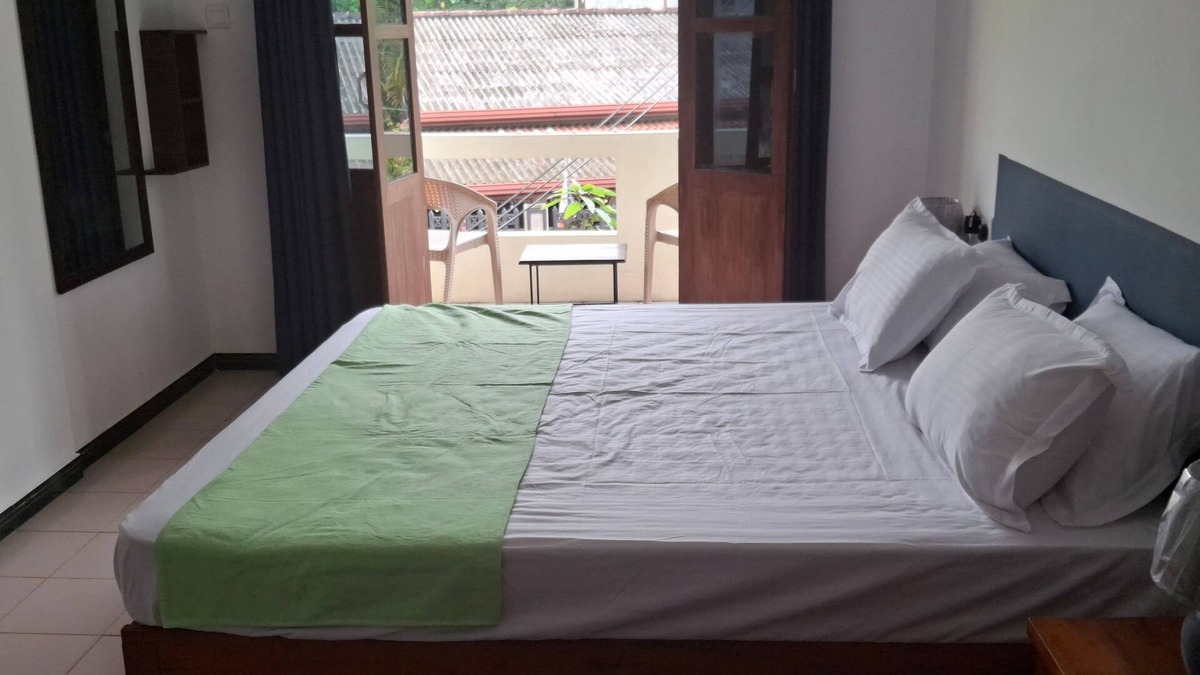 Beruwela Apartment | Sandy Steps- home stay upstairs 1 bedroom apartment with AC and WiFi
