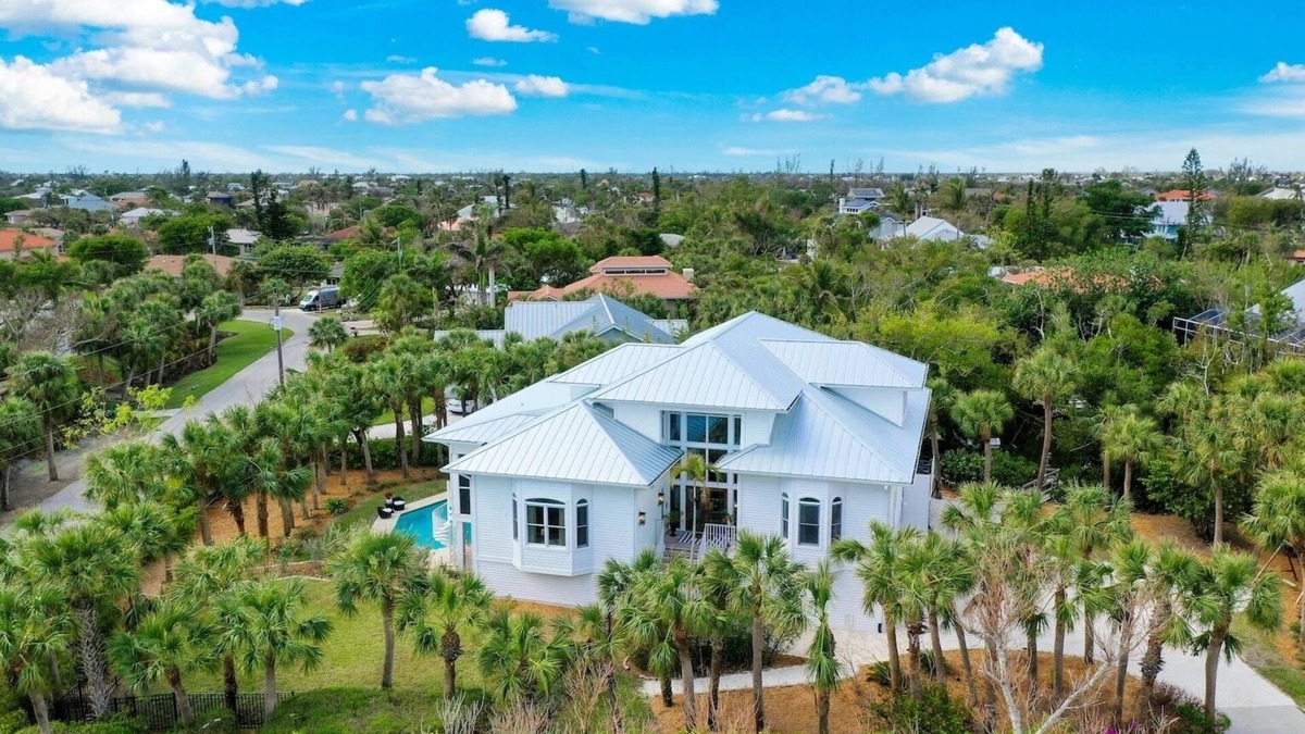 Shell Harbor House | Sanibel 6 bedroom Luxury Home with Pool,One Block from Beach,Pier and Canal View