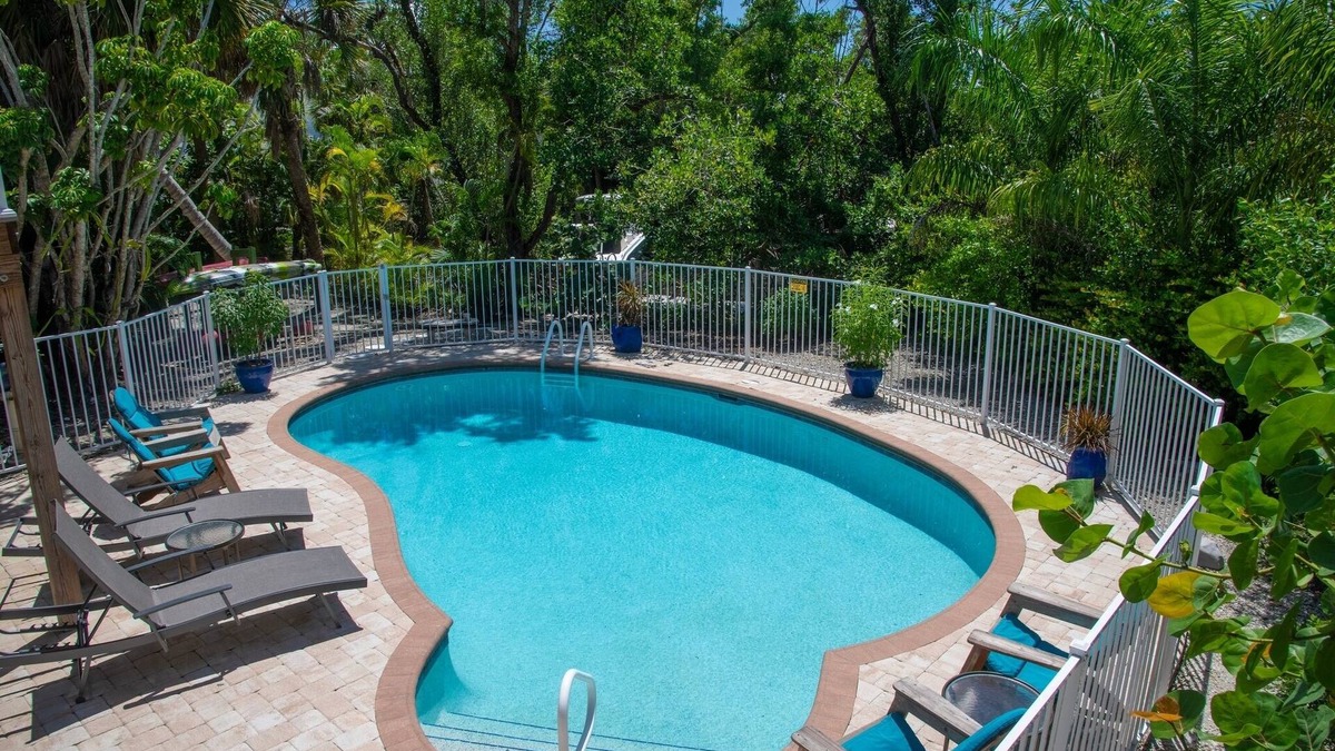 Shell Harbor House | "Sanibel Oasis", Private Home with heated pool on a canal