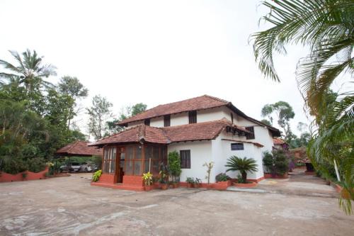Kakabe Bed & Breakfast | Sardar Bahadur's Heritage Bungalow Estate Stay
