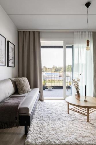 Oulu Apartment | Satamanhelmen näköalahuoneisto