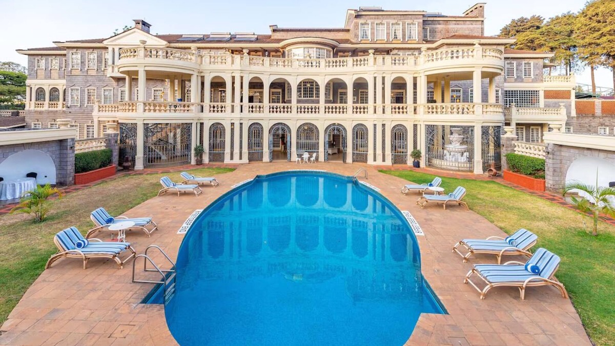 Limuru House | Scenic Escape: Elegant Room Overlooking Lush Grounds