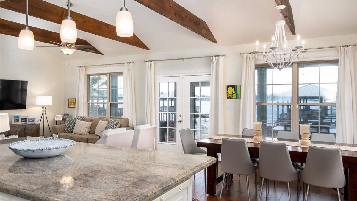 Ventress House | Screened porch and private pier on False River